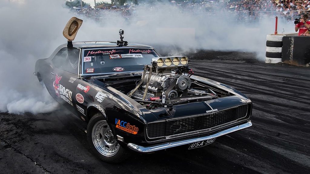 Muscle car doing a burnout at Summernats