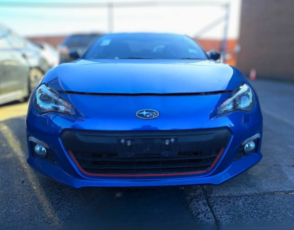 A japanese car ready for wrecking